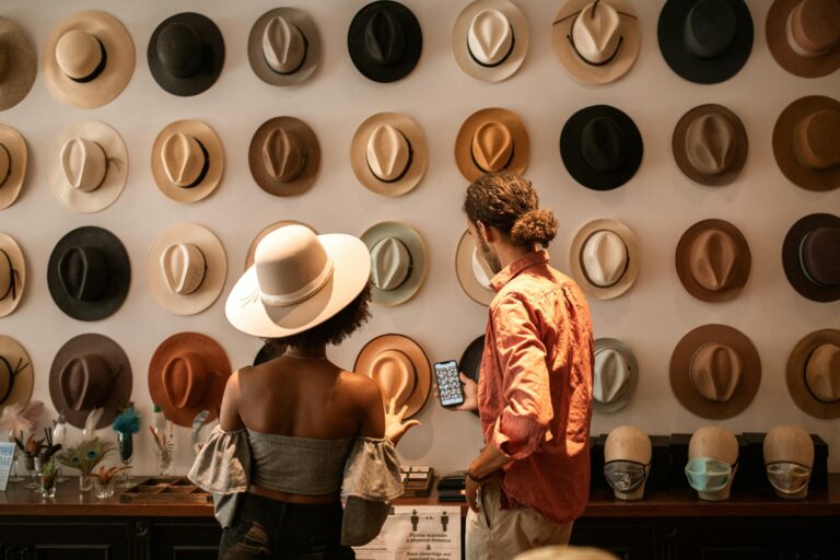woman in black tube top and white fedora hat